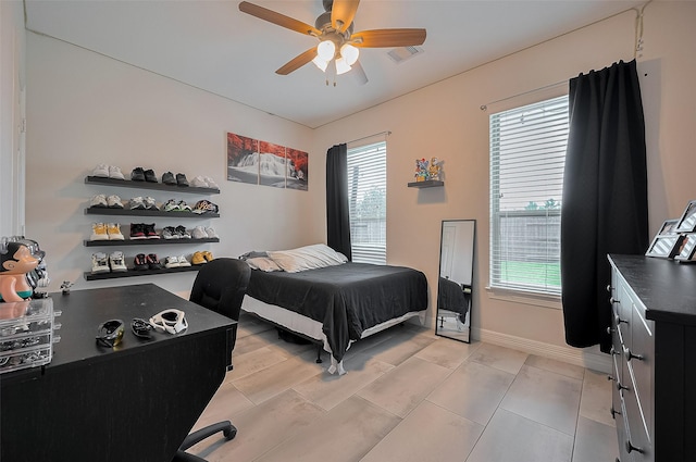 4227 Lodge Ranch Ct, Fulshear, TX 77441 - bedroom featuring multiple windows and ceiling fan