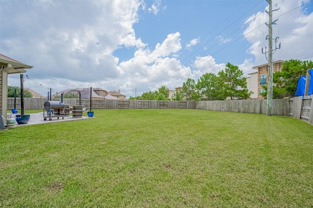 4227 Lodge Ranch Ct, Fulshear, TX 77441 - fenced backyard featuring a patio