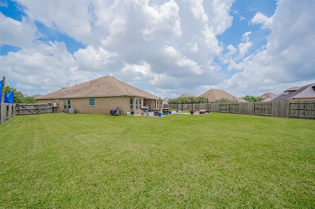4227 Lodge Ranch Ct, Fulshear, TX 77441 - fenced backyard with a patio