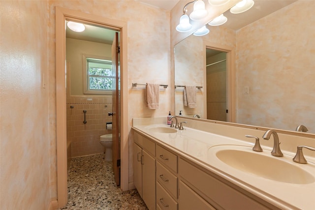 122 Blossom St, Lake Jackson, TX 77566 - bathroom featuring speckle patterned floor and double vanity