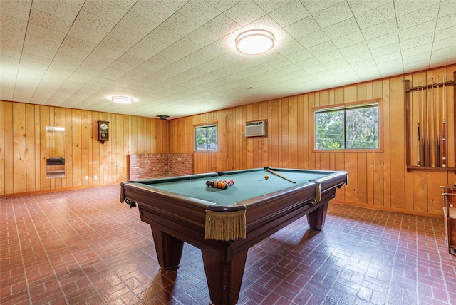122 Blossom St, Lake Jackson, TX 77566 - rec room featuring brick patterned flooring, heating unit, pool table, a wall unit AC, and wood walls