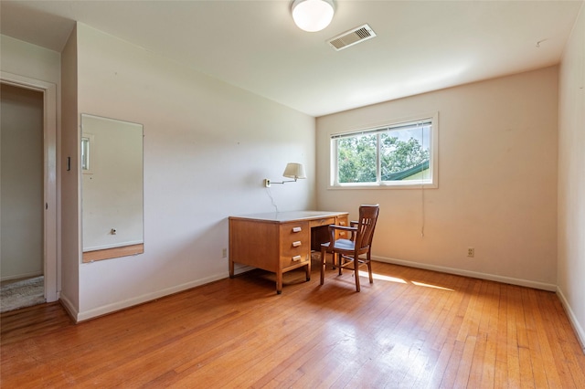 122 Blossom St, Lake Jackson, TX 77566 - office area with light wood-style flooring and baseboards