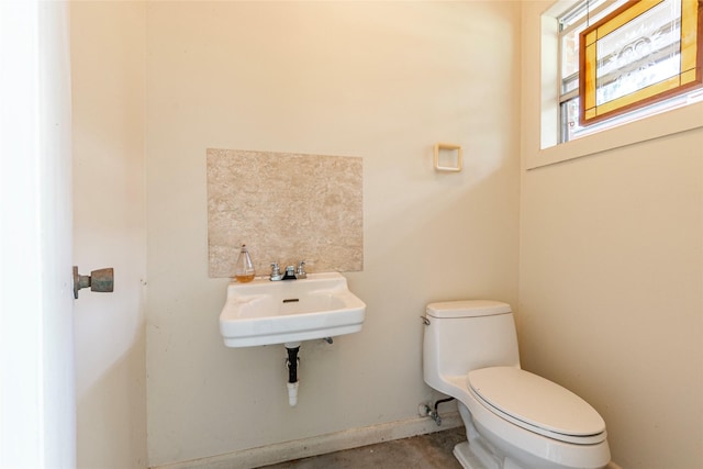 122 Blossom St, Lake Jackson, TX 77566 - bathroom featuring toilet and concrete flooring