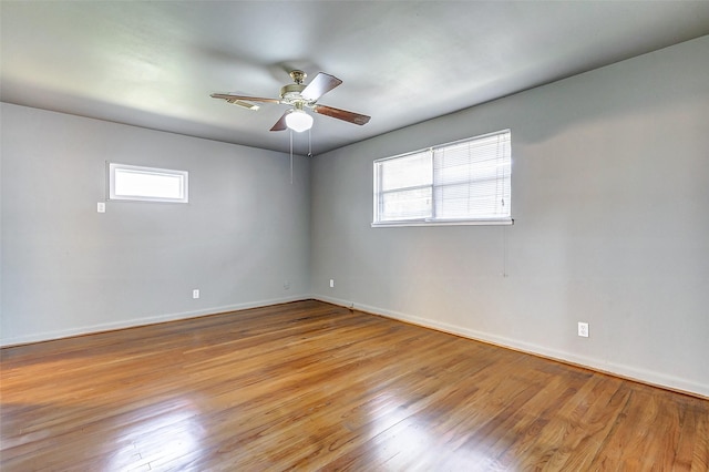 6763 Glen Rock Dr, Houston, TX 77087 - spare room featuring plenty of natural light, light wood-style flooring, and a ceiling fan