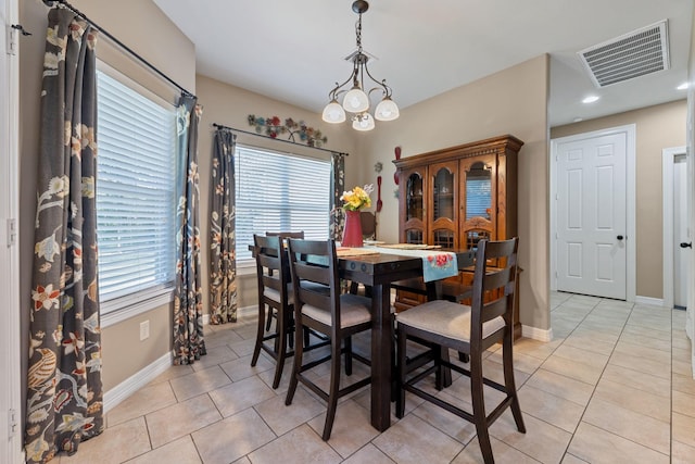 22206 Lantana Dr, Magnolia, TX 77355 - dining space featuring light tile patterned floors, healthy amount of natural light, and recessed lighting