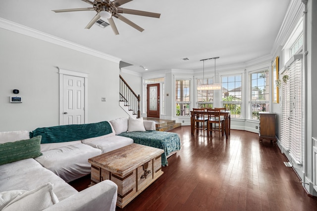 2111 Beall St, Houston, TX 77008 - living area with ceiling fan, crown molding, stairs, and dark wood finished floors
