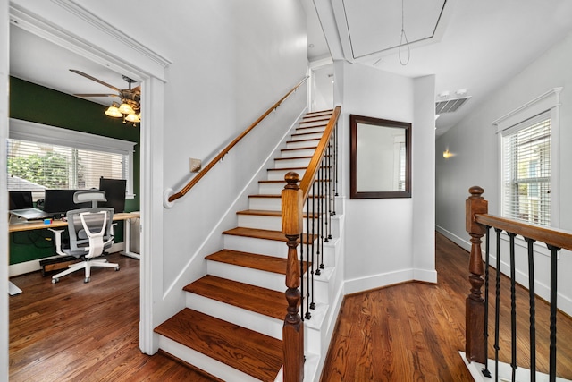 2111 Beall St, Houston, TX 77008 - stairway featuring attic access, healthy amount of natural light, and wood finished floors