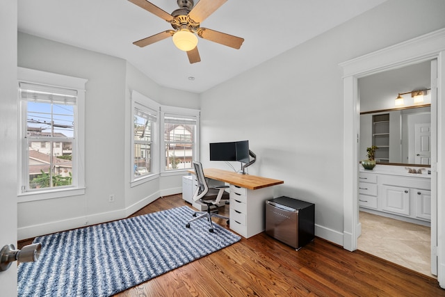 2111 Beall St, Houston, TX 77008 - home office featuring wood finished floors and a ceiling fan