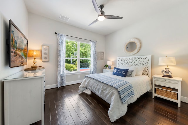 8550 Tombron Grove Rd, Magnolia, TX 77354 - bedroom featuring dark wood-style floors and a ceiling fan