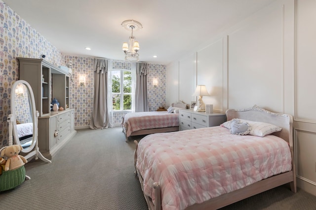 8550 Tombron Grove Rd, Magnolia, TX 77354 - carpeted bedroom featuring wallpapered walls and a chandelier