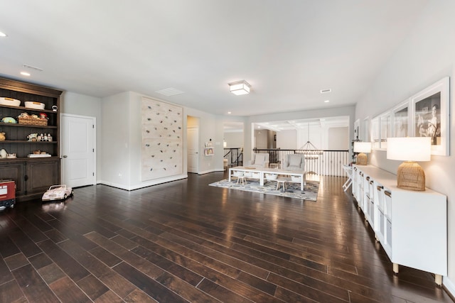 8550 Tombron Grove Rd, Magnolia, TX 77354 - living area featuring wood finished floors and recessed lighting