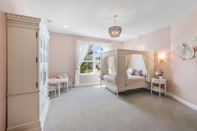 8550 Tombron Grove Rd, Magnolia, TX 77354 - bedroom featuring light colored carpet and a chandelier