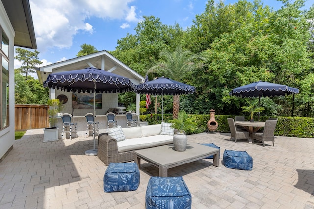 8550 Tombron Grove Rd, Magnolia, TX 77354 - view of patio with outdoor dining space