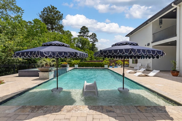 8550 Tombron Grove Rd, Magnolia, TX 77354 - view of swimming pool with a patio and a fenced backyard