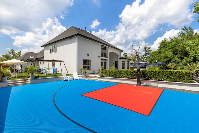8550 Tombron Grove Rd, Magnolia, TX 77354 - view of basketball court featuring basketball hoop