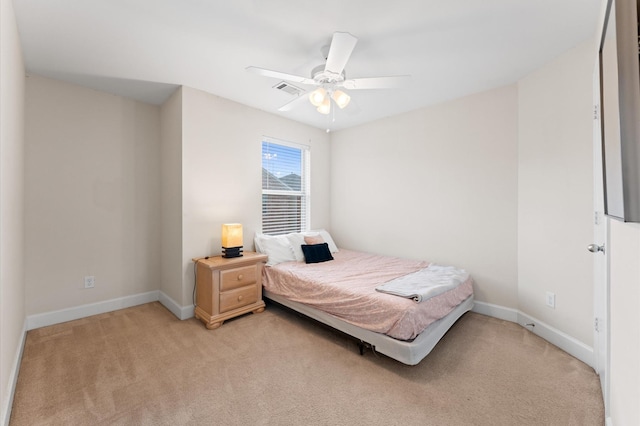 3736 Main Poplar Dr, Houston, TX 77025 - bedroom featuring light colored carpet and ceiling fan