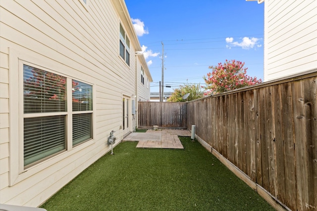 3736 Main Poplar Dr, Houston, TX 77025 - fenced backyard featuring a patio area
