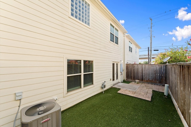 3736 Main Poplar Dr, Houston, TX 77025 - rear view of house featuring a fenced backyard and a patio