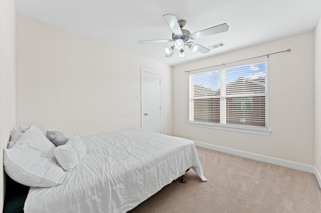 3736 Main Poplar Dr, Houston, TX 77025 - carpeted bedroom featuring baseboards and ceiling fan