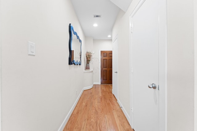 3736 Main Poplar Dr, Houston, TX 77025 - corridor featuring light wood finished floors and recessed lighting