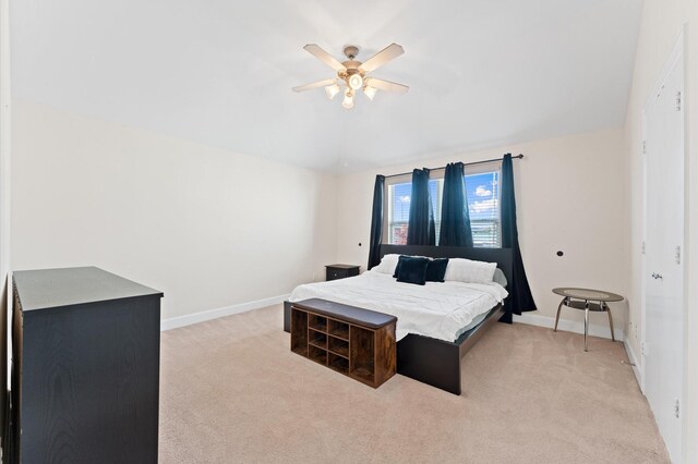 3736 Main Poplar Dr, Houston, TX 77025 - bedroom featuring light colored carpet, ceiling fan, and vaulted ceiling