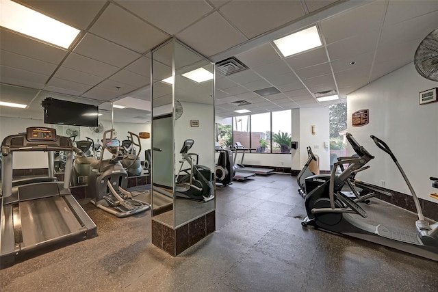 3525 Sage Rd Unit 1703, Houston, TX 77056 - workout area with a drop ceiling and baseboards