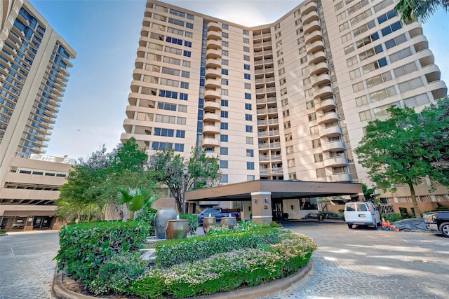3525 Sage Rd Unit 1703, Houston, TX 77056 - view of building exterior with covered parking