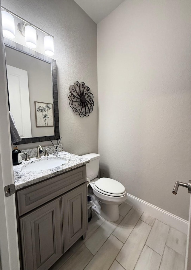 4143 Shackleton Ct, Iowa Colony, TX 77583 - bathroom with vanity and a textured wall