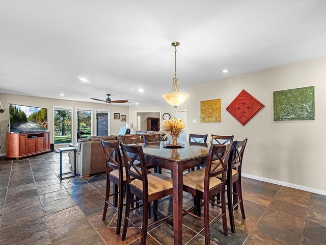 4710 Mckeever Ln, Missouri City, TX 77459 - dining room featuring stone tile floors, recessed lighting, and ceiling fan