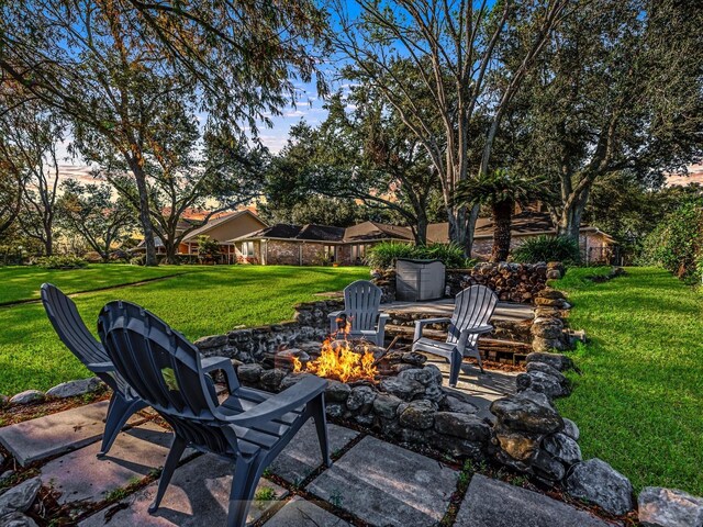 4710 Mckeever Ln, Missouri City, TX 77459 - view of patio featuring an outdoor fire pit