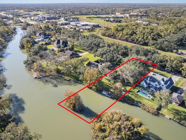 4710 Mckeever Ln, Missouri City, TX 77459 - aerial view of property and surrounding area with a large body of water and property parcel outlined