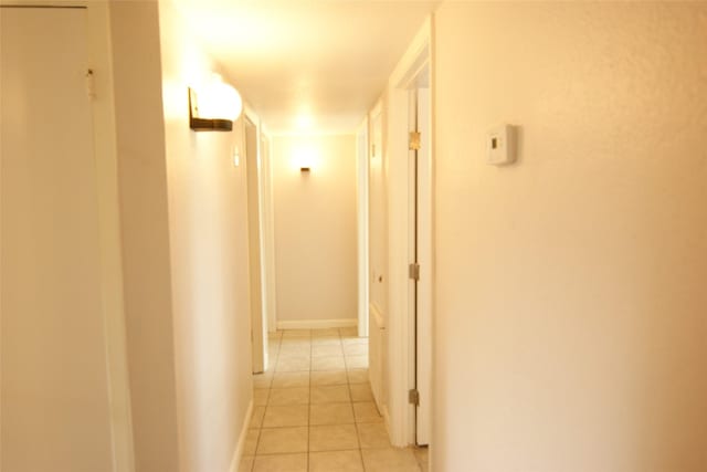 9711 Courben Ln, Houston, TX 77078 - hallway with light tile patterned flooring