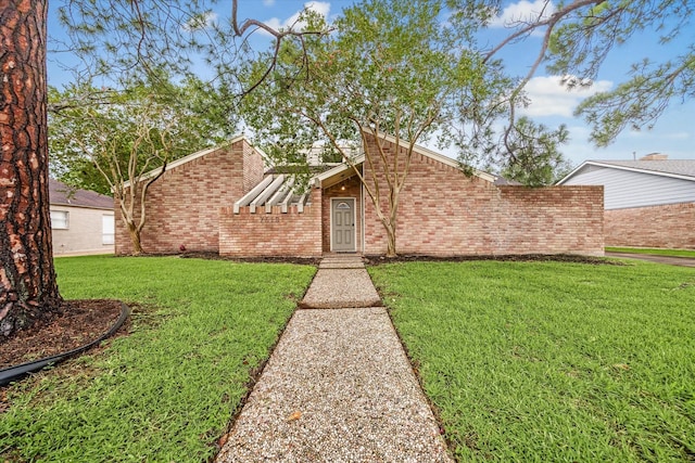 7619 Bankside Dr, Houston, TX 77071 - mid-century home with a front yard and brick siding