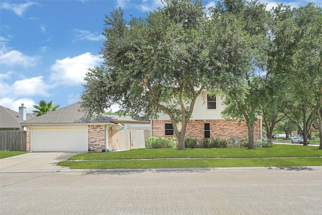 7823 Autumn Hollow Ln, Houston, TX 77041 - view of front of property with brick siding, concrete driveway, and an attached garage