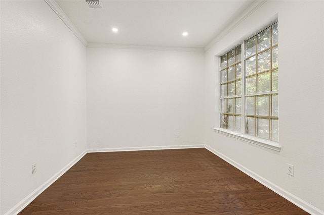 7823 Autumn Hollow Ln, Houston, TX 77041 - spare room featuring ornamental molding, dark wood-type flooring, and recessed lighting