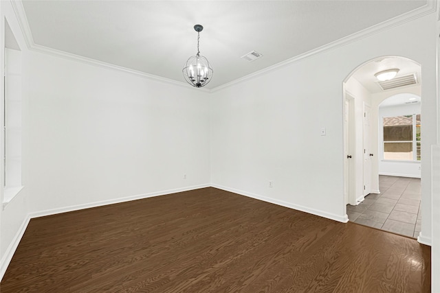 7823 Autumn Hollow Ln, Houston, TX 77041 - spare room featuring dark wood-style flooring, arched walkways, crown molding, and a chandelier
