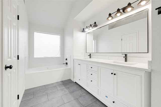 7823 Autumn Hollow Ln, Houston, TX 77041 - bathroom featuring double vanity, a bath, and tile patterned flooring