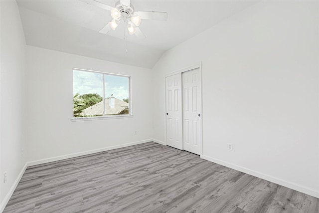7823 Autumn Hollow Ln, Houston, TX 77041 - unfurnished bedroom with wood finished floors, vaulted ceiling, a closet, and ceiling fan