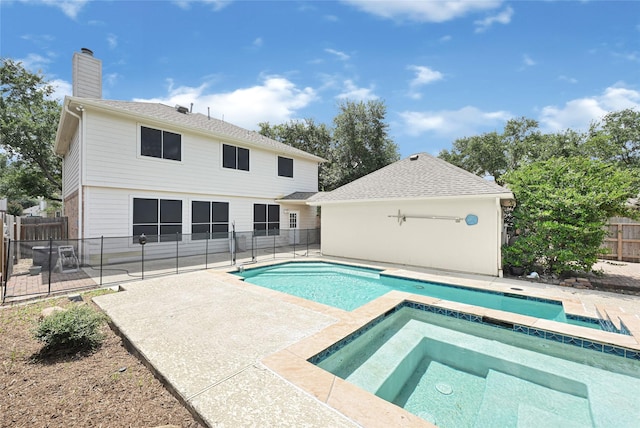 7823 Autumn Hollow Ln, Houston, TX 77041 - view of swimming pool featuring an in-ground hot tub, a patio, and a fenced backyard