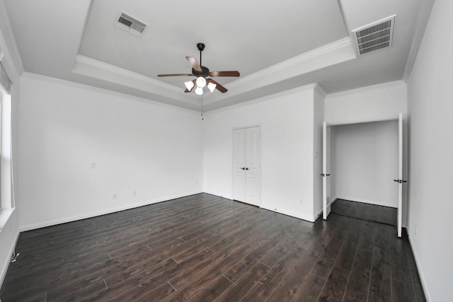 4330 Lasker Brook Ct, Katy, TX 77494 - unfurnished room with a tray ceiling, dark wood-type flooring, a ceiling fan, and ornamental molding