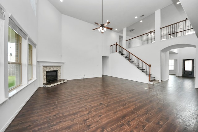 4330 Lasker Brook Ct, Katy, TX 77494 - unfurnished living room with plenty of natural light, a towering ceiling, wood finished floors, recessed lighting, and a ceiling fan