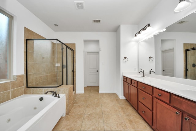 4330 Lasker Brook Ct, Katy, TX 77494 - full bath with a whirlpool tub, a stall shower, double vanity, and tile patterned floors