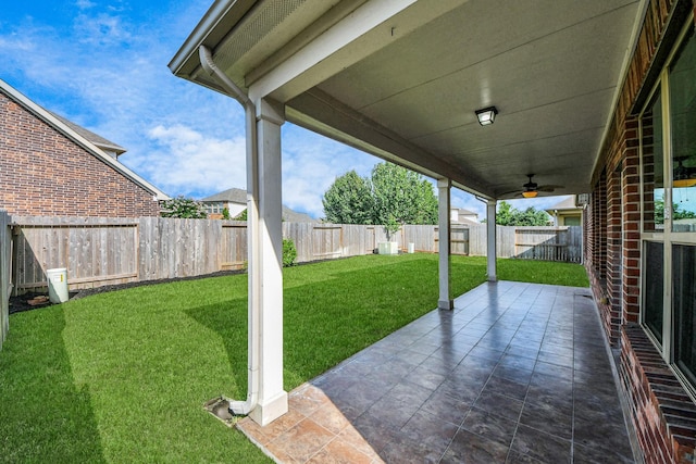 4330 Lasker Brook Ct, Katy, TX 77494 - fenced backyard featuring a patio and a ceiling fan