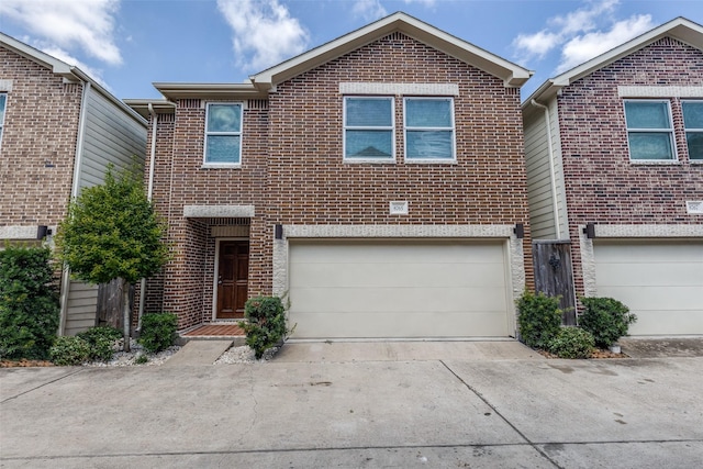 8765 Bryam, Houston, TX 77061 - traditional-style home with driveway, brick siding, and an attached garage