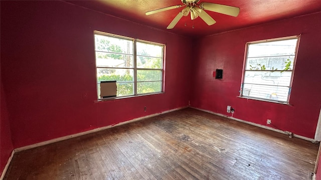 7218 Bretshire Dr, Houston, TX 77016 - empty room with hardwood / wood-style floors and a ceiling fan
