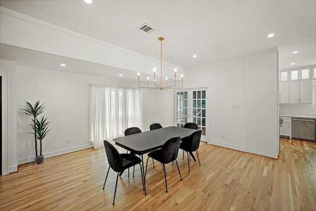 5630 Lymbar Dr, Houston, TX 77096 - dining room featuring a chandelier, light wood-style floors, and recessed lighting