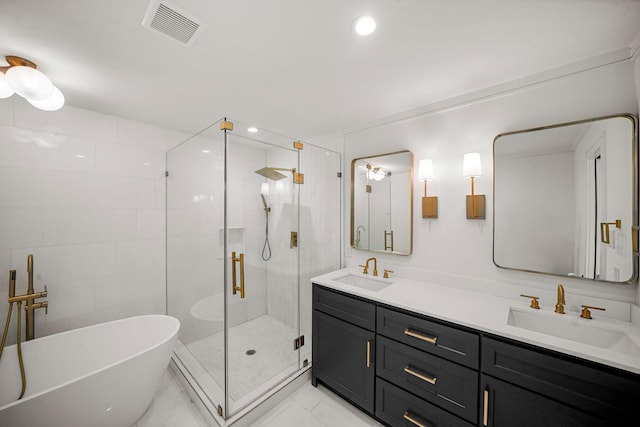 5630 Lymbar Dr, Houston, TX 77096 - full bathroom featuring a shower stall, double vanity, a soaking tub, and recessed lighting