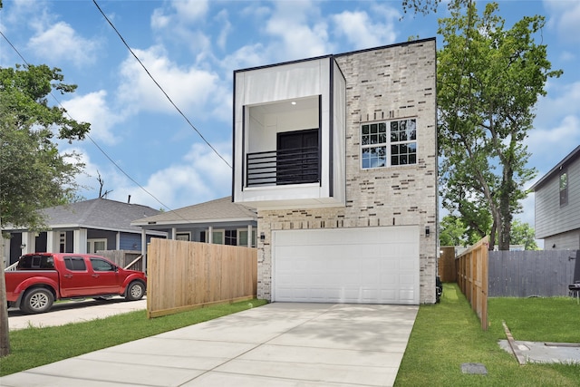 7922 Sealey St, Houston, TX 77088 - view of front facade with a garage, driveway, and brick siding