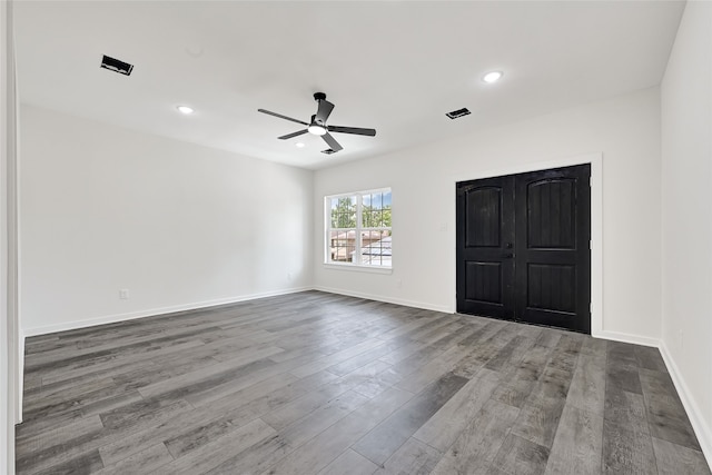 7922 Sealey St, Houston, TX 77088 - unfurnished bedroom featuring wood finished floors, recessed lighting, and ceiling fan