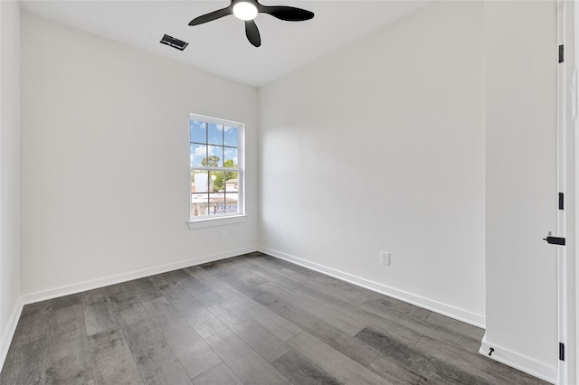 7922 Sealey St, Houston, TX 77088 - empty room with ceiling fan and dark wood finished floors